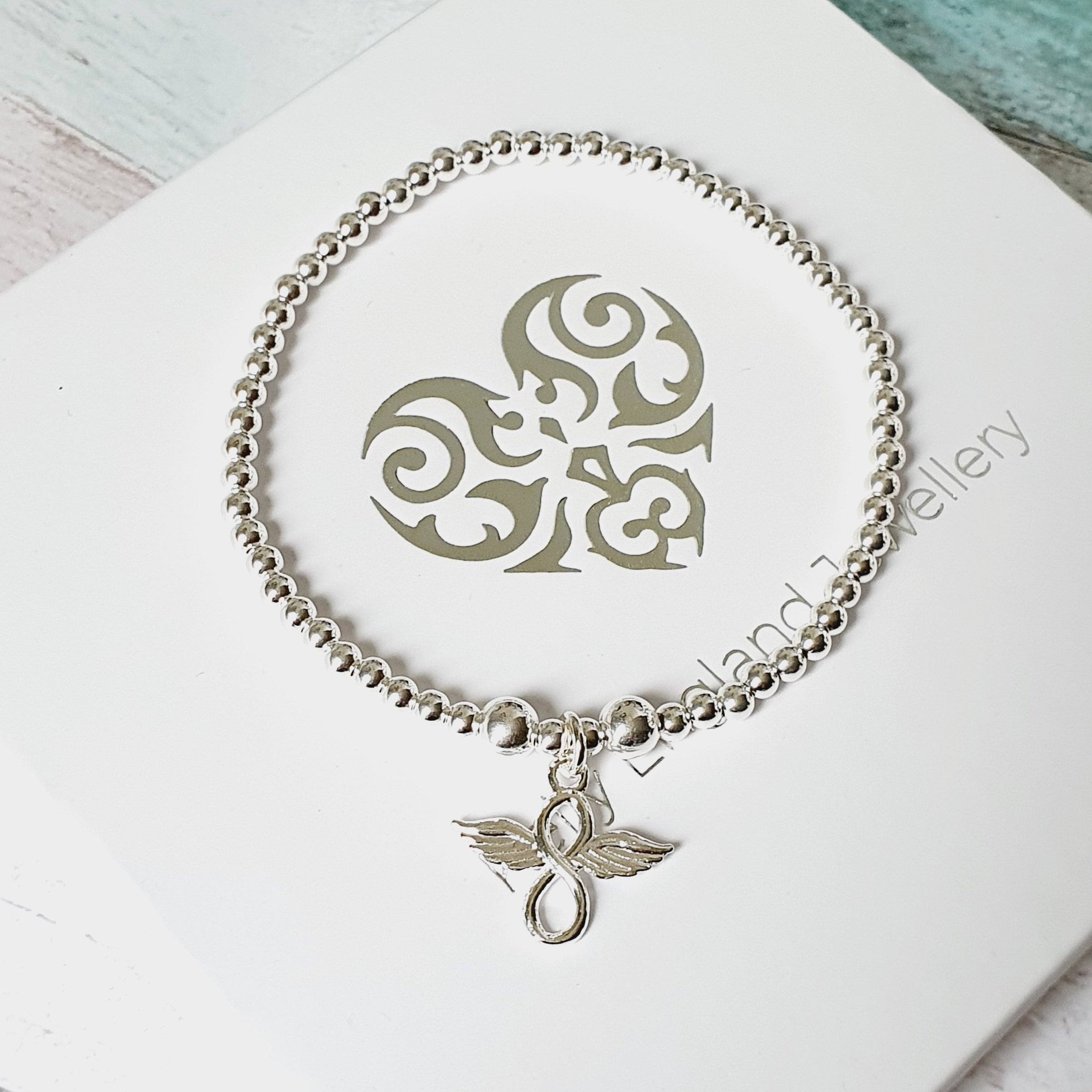 Silver guardian angel on sale bracelet