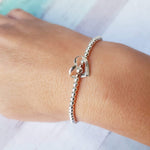 Sterling Silver & Rose Gold Floating Heart Bracelet